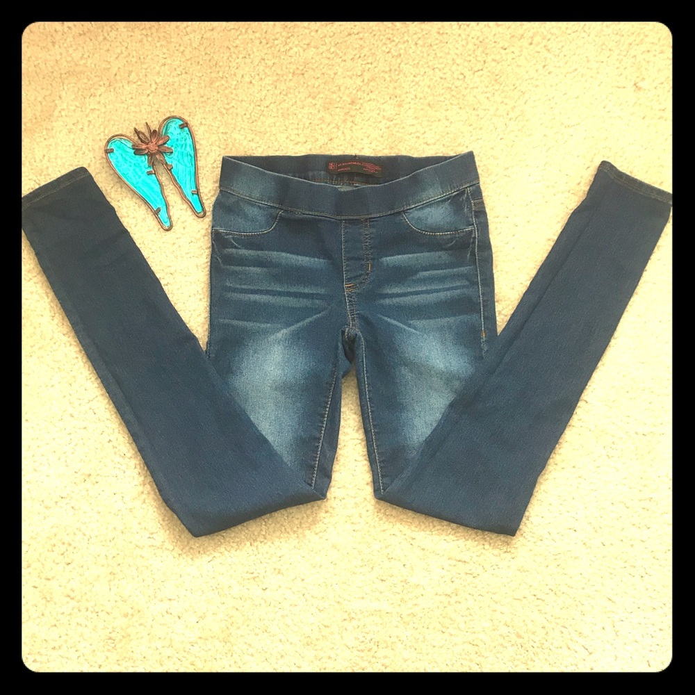 Skinny dark blue faded jeggings